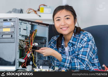 woman at home with broken technology