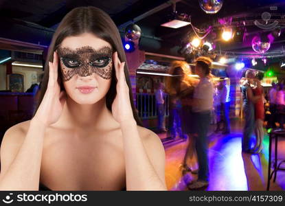 Woman at mask portrait at masquerade