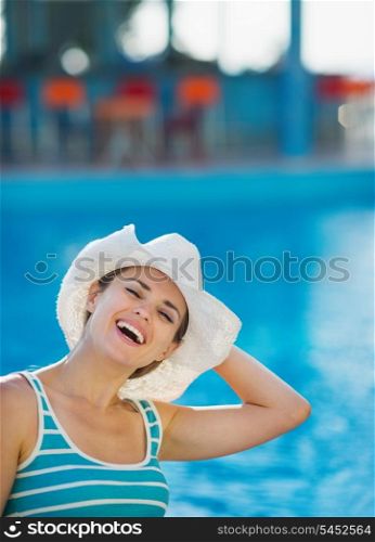 Woman at pool bar enjoying vacation