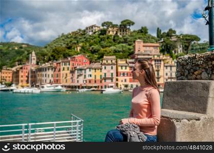 Woman at Portofino village on Ligurian coast in Italy