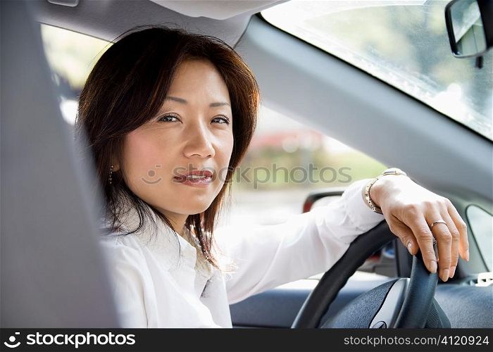 Woman at steering wheel