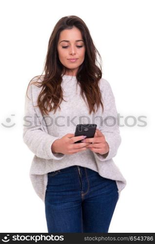 Woman at the phone. Young beautiful woman at the phone, isolated over a white background