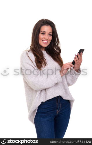 Woman at the phone. Young beautiful woman at the phone, isolated over a white background