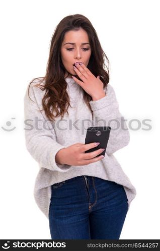 Woman at the phone. Young beautiful woman at the phone, isolated over a white background