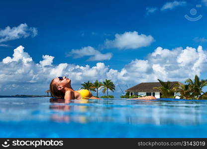 Woman at the swimming pool