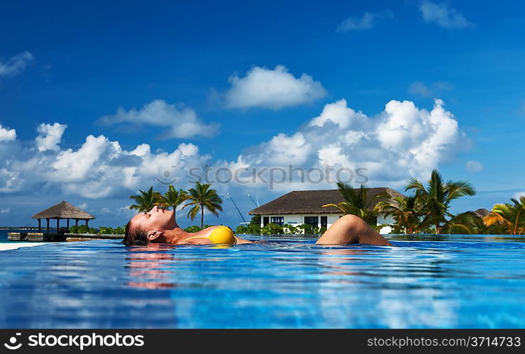 Woman at the swimming pool