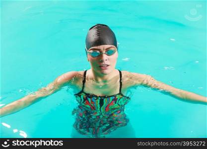Woman athlete in swimming pool water. Sport.. Woman athlete in swimming pool water. Water sport comptetition exercise. Human swimmer training.