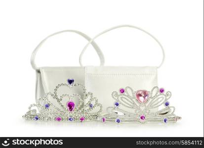 Woman bag and tiara isolated on the white background