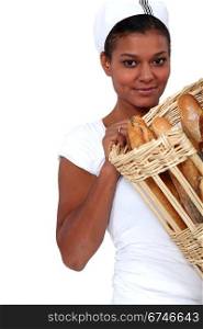 Woman baker with a basket of bread