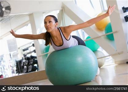Woman Balancing On Swiss Ball