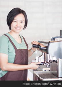 Woman barista enjoy at work, stock photo