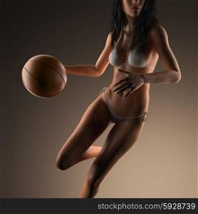 woman basketball player holding the ball