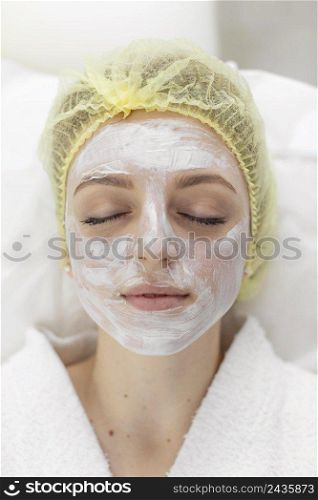 woman beauty clinic face treatment 3