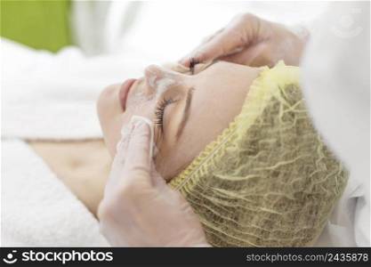 woman beauty clinic face treatment 9