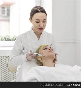 woman beauty clinic filler treatment 2