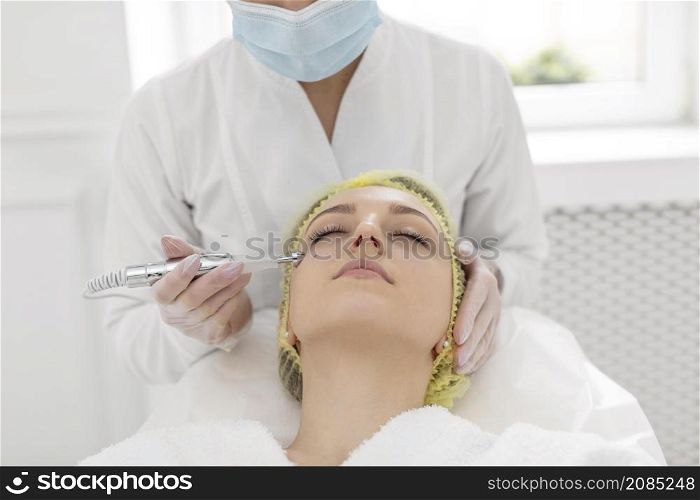 woman beauty clinic filler treatment