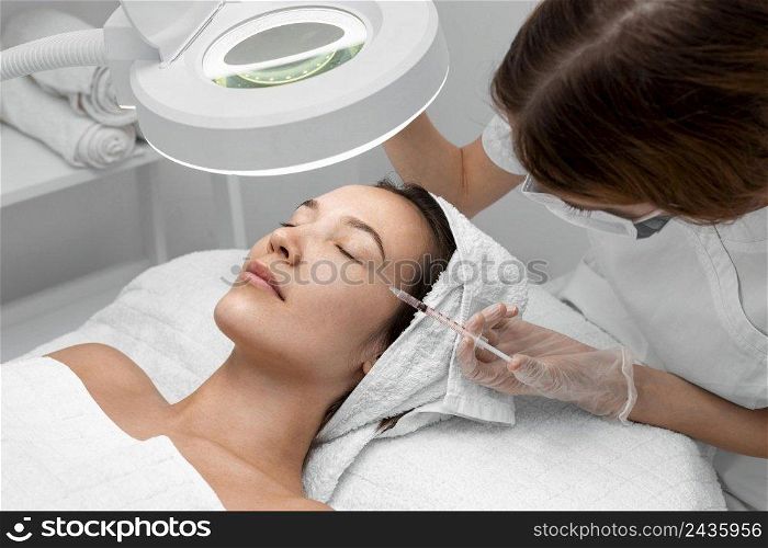 woman beauty salon face treatment 5