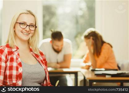 Woman being proud of teamwork people sitting in class planning concept, studying together creating new startup.. Woman being proud of teamwork