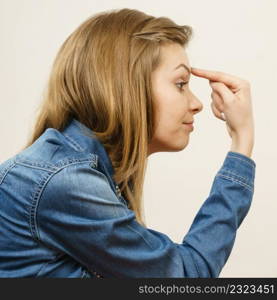 Woman being uncerta∫y skeptical questioning something and≥sturing having disgusted face expression.. Woman being skeptical questioning something