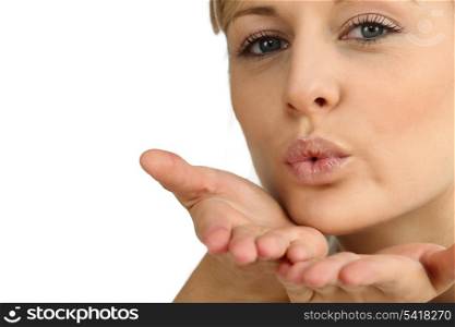 Woman blowing a kiss
