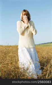 Woman Blowing Her Nose