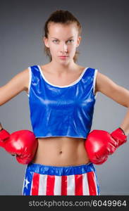 Woman boxer in uniform with US symbols