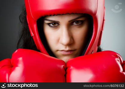 Woman boxer on white background