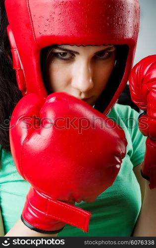 Woman boxer on white background