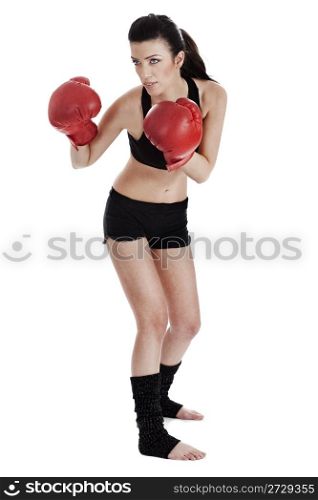 Woman boxer ready to punch the opponent in boxing over white background