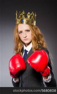 Woman boxer with crown and red gloves