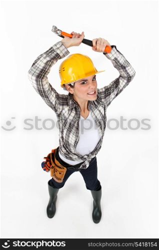 Woman brandishing a hammer