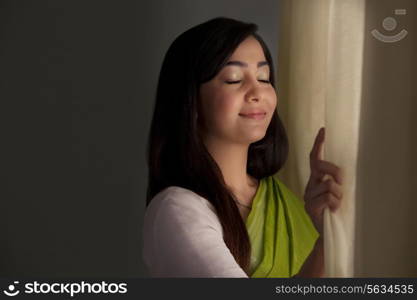 Woman breathing in fresh air