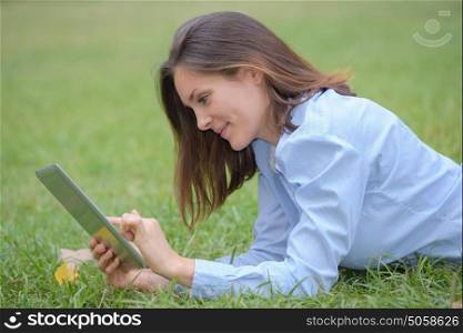 woman browsing on the tablet
