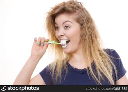 Woman brushing cleaning teeth. Positive girl with toothbrush. Oral hygiene. Isolated on white background. Woman brushing cleaning teeth