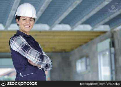 woman builder looking at camera