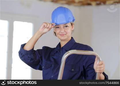 woman builder looking at the camera