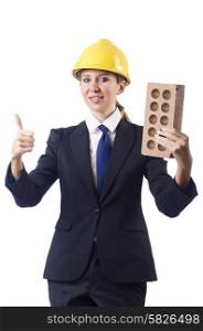 Woman builder with brick on white
