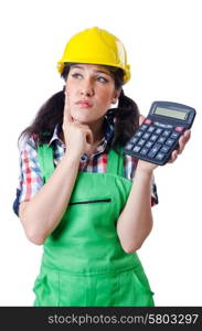 Woman builder with calculator on white