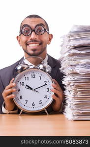 Woman businesswoman with giant alarm clock