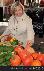 Woman buying fruit at the market