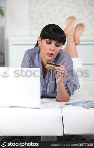 Woman buying online with a credit card