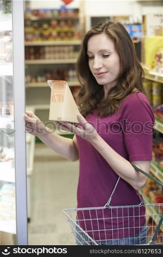 Woman Buying Sandwich From Supermarket