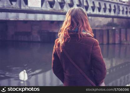 Woman by canal
