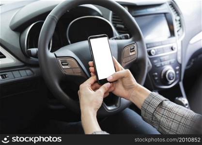 woman car holding phone mock up