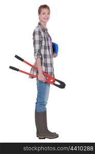 Woman carrying bolt cutters