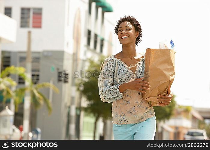 Woman Carrying Groceries Home