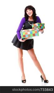 Woman carrying moving boxes. Young woman moving house to new home holding cardboard boxes isolated on white background standing in full length