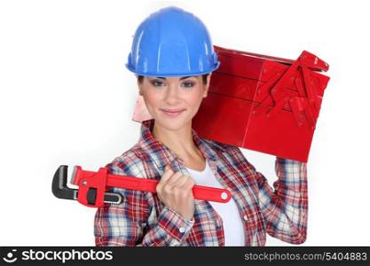 Woman carrying tool box