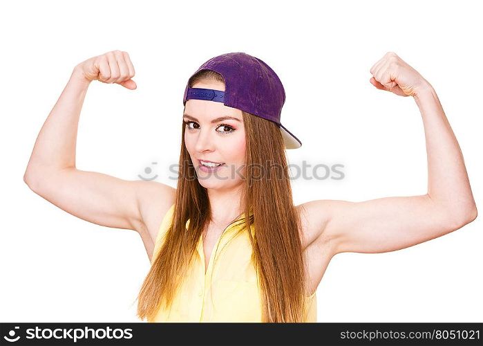 Woman casual style showing off muscles biceps . Woman casual style teen girl cap on head showing off muscles biceps. Youth style. Power and strength concept. Studio shot isolated on white