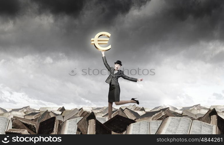 Woman catch euro. Young businesswoman in suit and bowler hat catching euro symbol